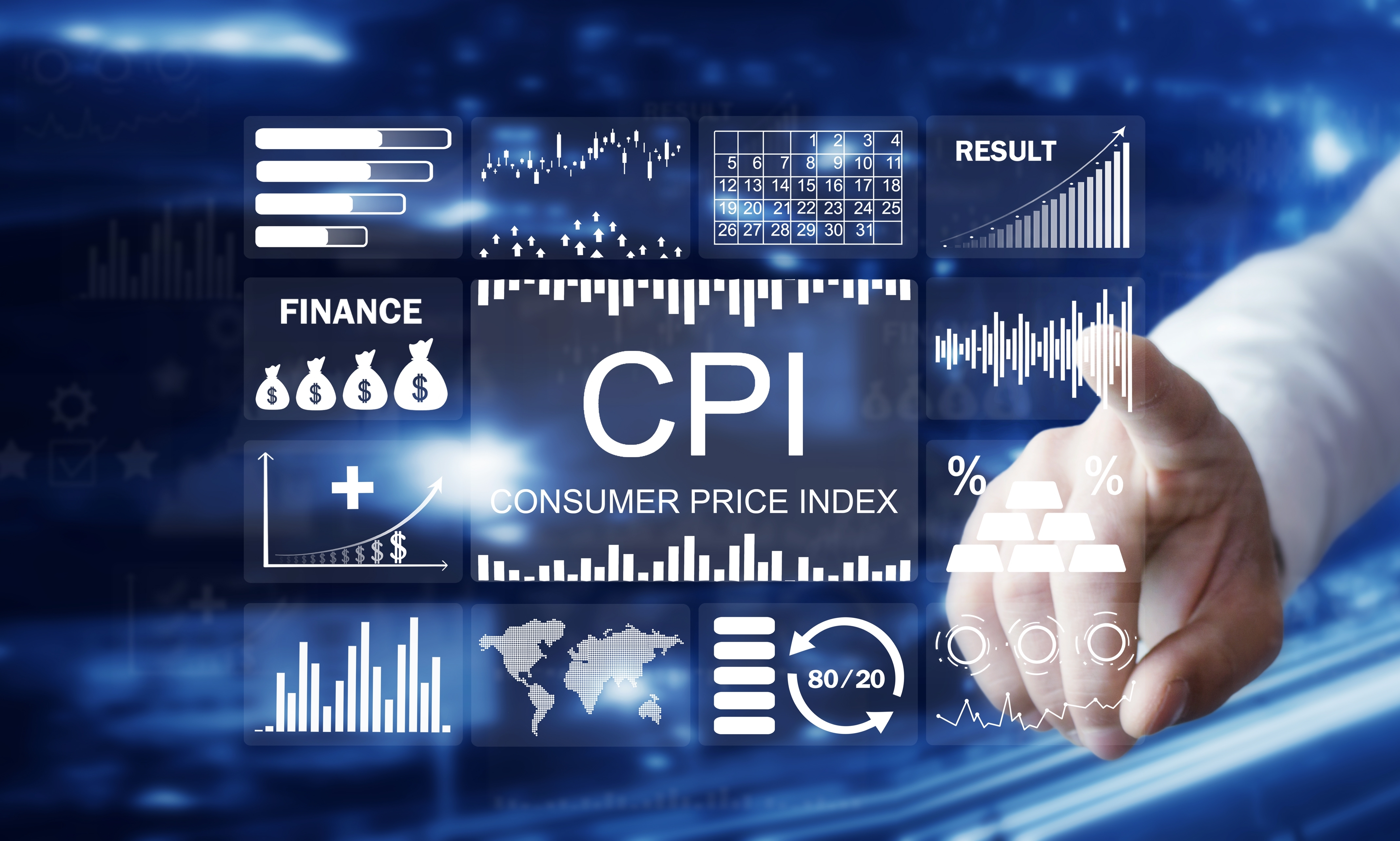 Man in a button-down shirt pointing at CPI inflation graphs on a digital screen, representing U.S. consumer price data and economic analysis.