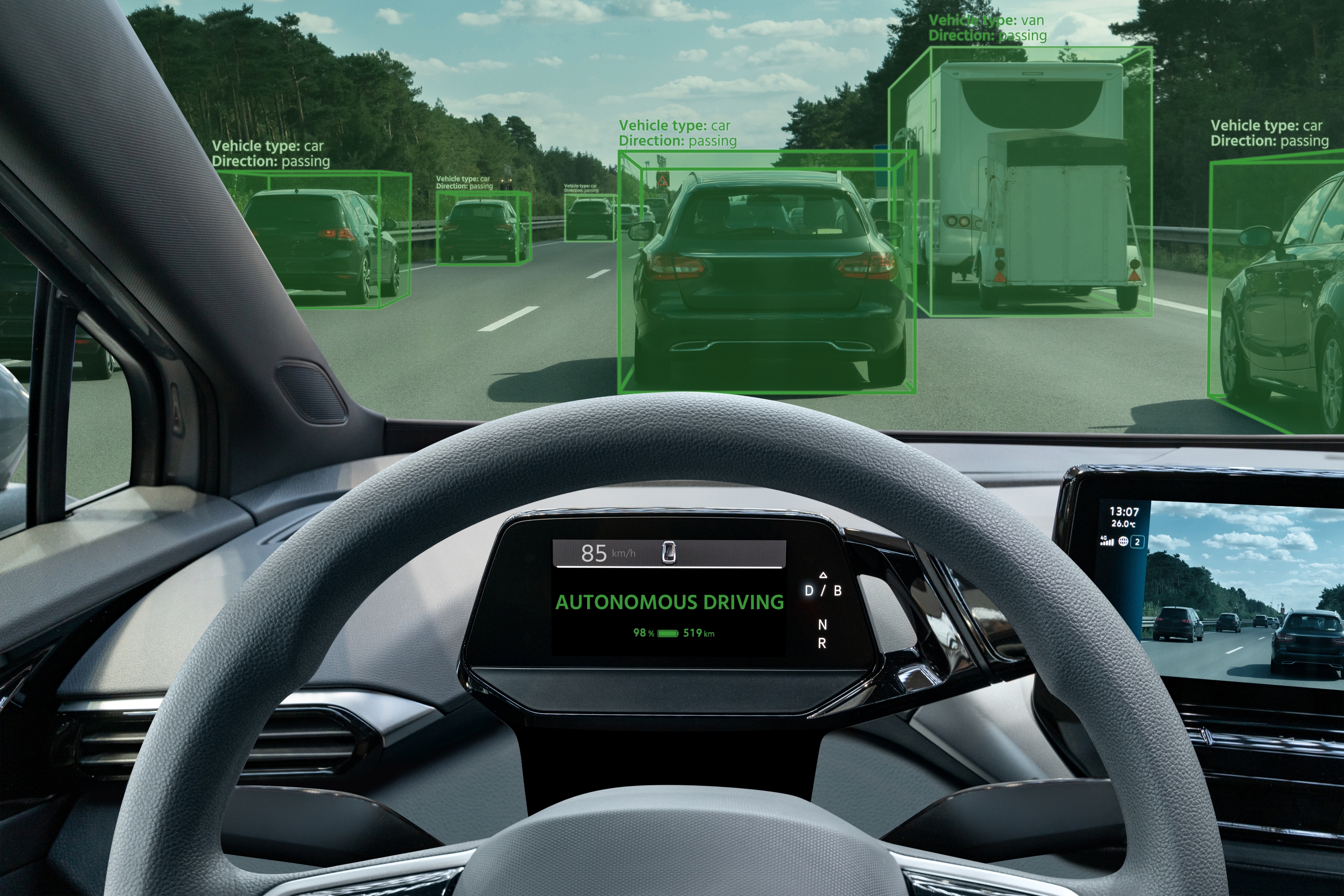 View from inside an autonomous vehicle showing driverless technology identifying cars and traffic on the road.
